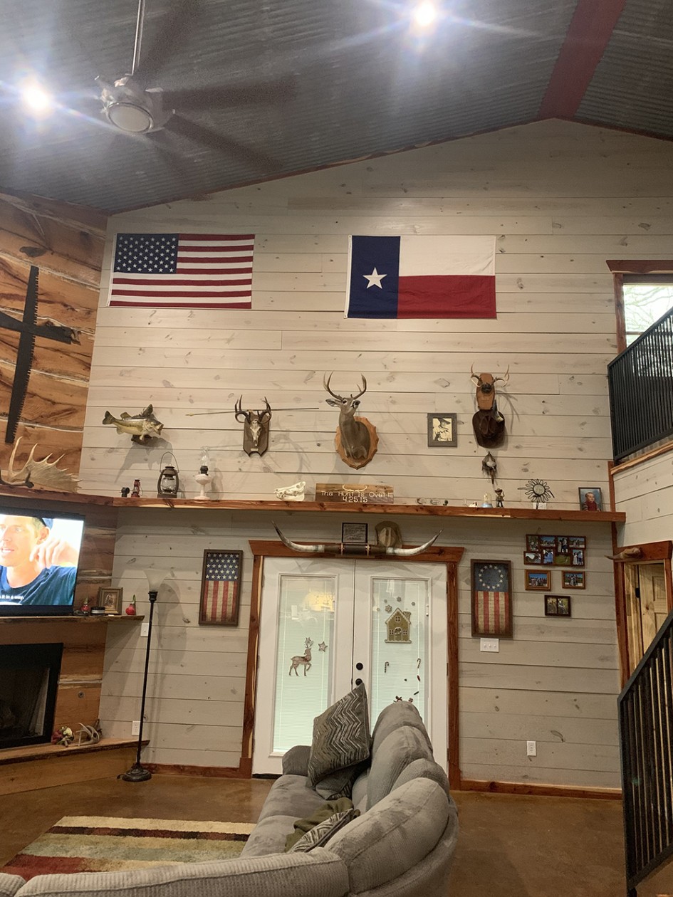 Barndominium living room interior with country decor.