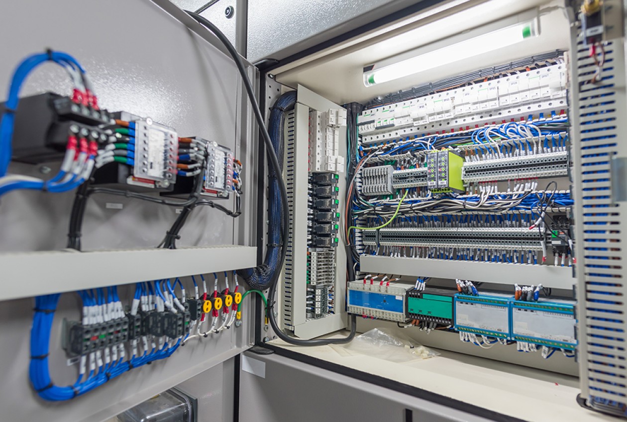 Electrical unit with electrical wiring in a facility.